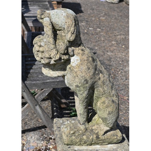 15 - A weathered cast stone garden statue on plinth - a hound bearing cornucopia basket, 96 cm h