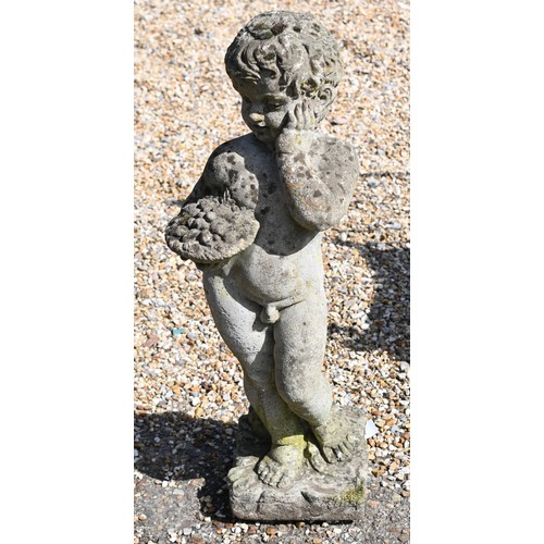 22 - A weathered cast stone statue of a cherub, 70 cm high