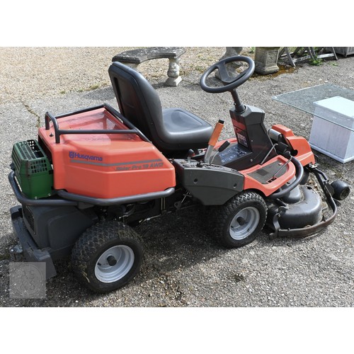 5A - A Husqvarna Pro 18 AWD Kawasaki powered 18HP petrol ride on mower, with adjustable front deck and re... 
