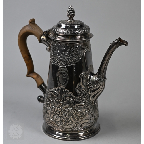 118 - A George II silver coffee pot of tapering form, the domed cover with pine-cone finial, scrolling fru... 
