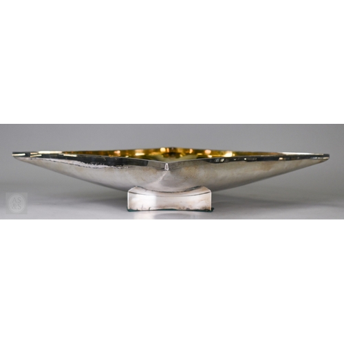 119 - John M Willmin for Aurum Ltd: a large modern design silver bowl of concave square form with gilt int... 
