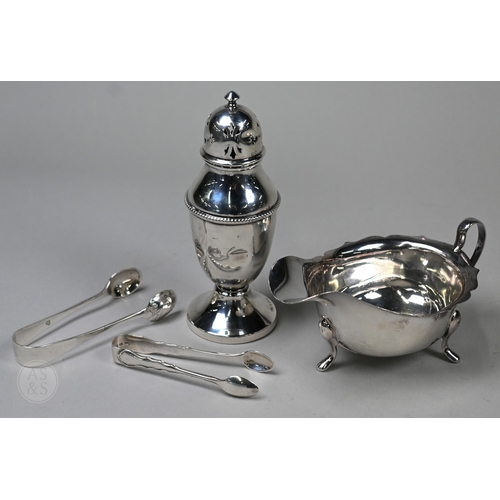 120 - A silver cream boat Viners, Sheffield 1961 and two pairs of sugar tongs, 5.2oz (163g) total, to/w a ... 