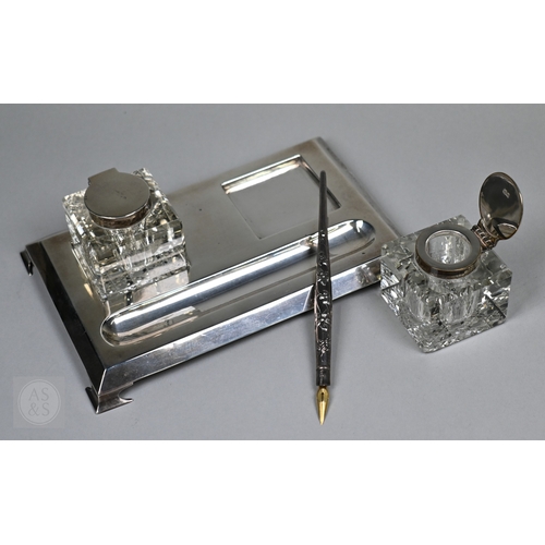 121 - A silver inkstand with two square cut gass inkwells with silver tops, S Blanckensee & Son Ltd., ... 