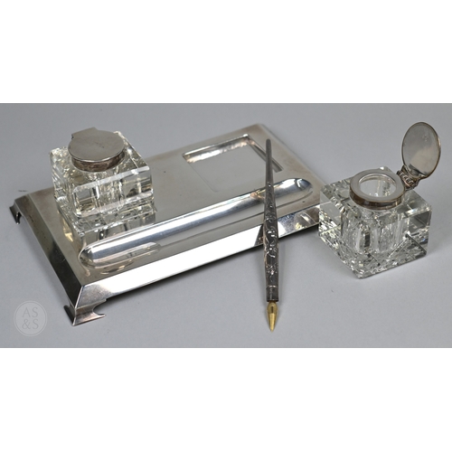 121 - A silver inkstand with two square cut gass inkwells with silver tops, S Blanckensee & Son Ltd., ... 