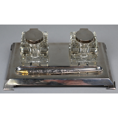 121 - A silver inkstand with two square cut gass inkwells with silver tops, S Blanckensee & Son Ltd., ... 