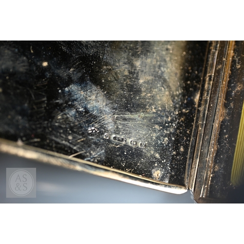 180 - An Art Deco 9ct yellow gold cigarette case of rectangular form, engine turned decoration, applied mo... 