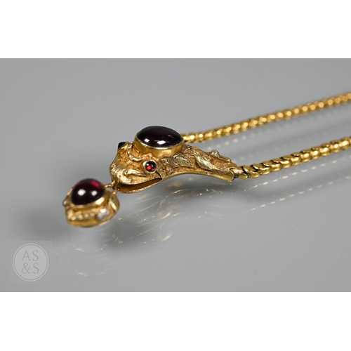 205 - An antique snake/serpent necklace, the snake head mounted with cabochon garnets and holding a heart-... 