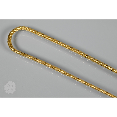 205 - An antique snake/serpent necklace, the snake head mounted with cabochon garnets and holding a heart-... 