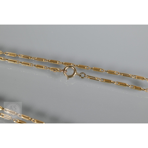 206 - A 15ct yellow gold long rectangular link/paperclip guard chain, 72 cm long (closed), approx 21.1g