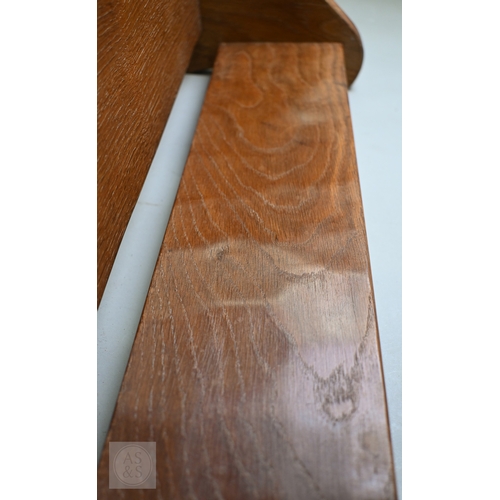 625 - 'Beaverman', Colin Almack (1930-1996) an English oak book trough, with carved beaver trademark, 52.5... 