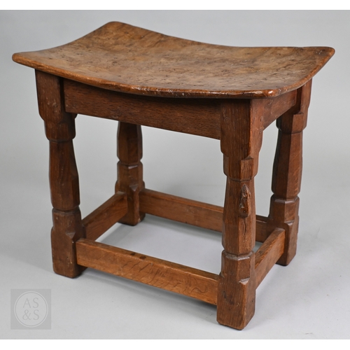 626 - Robert Thompson (1876-1955), a Mouseman of Kilburn pollard oak saddle seat stool, circa 1930s, the n... 