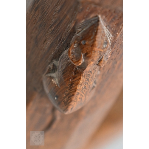 626 - Robert Thompson (1876-1955), a Mouseman of Kilburn pollard oak saddle seat stool, circa 1930s, the n... 