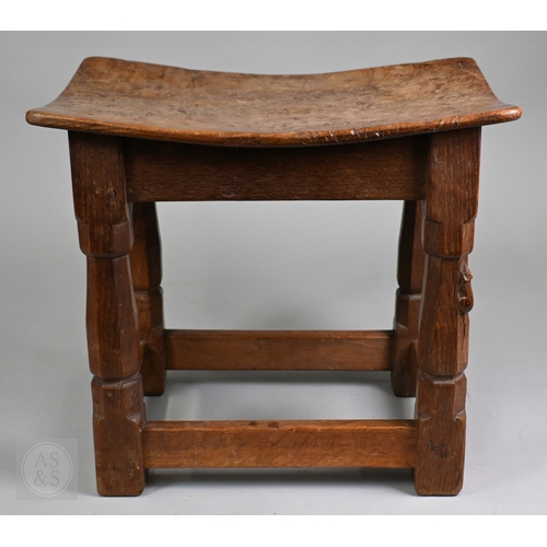 626 - Robert Thompson (1876-1955), a Mouseman of Kilburn pollard oak saddle seat stool, circa 1930s, the n... 