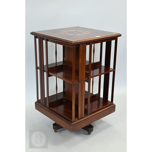 627 - A boxwood inlaid satinwood revolving bookcase, on castors, 51 cm x 51 cm x 82 cm h