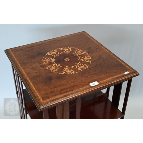 627 - A boxwood inlaid satinwood revolving bookcase, on castors, 51 cm x 51 cm x 82 cm h