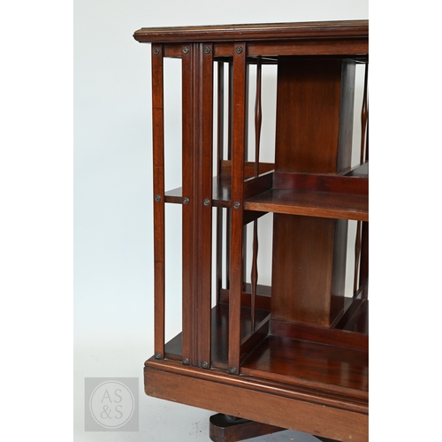 627 - A boxwood inlaid satinwood revolving bookcase, on castors, 51 cm x 51 cm x 82 cm h