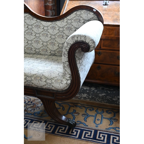 676 - A Regency mahogany show framed sofa, the arched crest centred foliate moulding in relief, over scrol... 