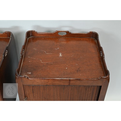 646 - A pair of George III mahogany tray top step commodes, with opposing tambour doors over green skiver ... 