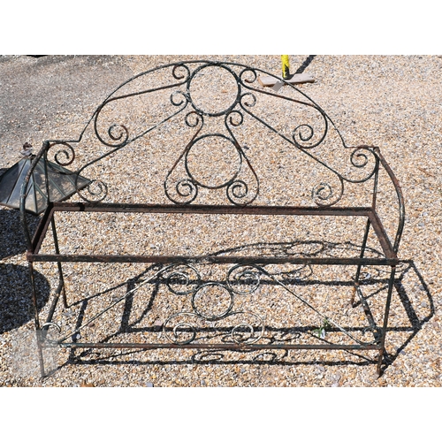 14 - An ornate French style wrought iron bench frame, 118 cm long, a/f