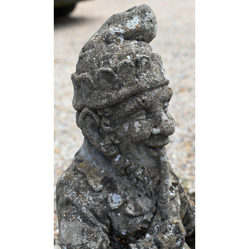 19 - Two weathered reconstituted stone garden gnomes, smoking pipes (2)