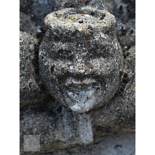 19 - Two weathered reconstituted stone garden gnomes, smoking pipes (2)
