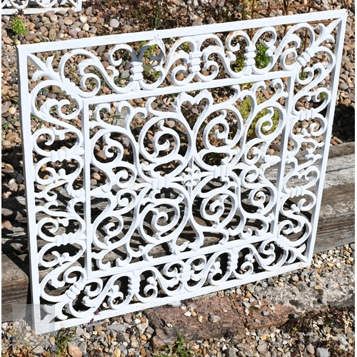 40 - A trio of Victorian style cast grilles, painted white, each 69 cm x 65 cm (3)