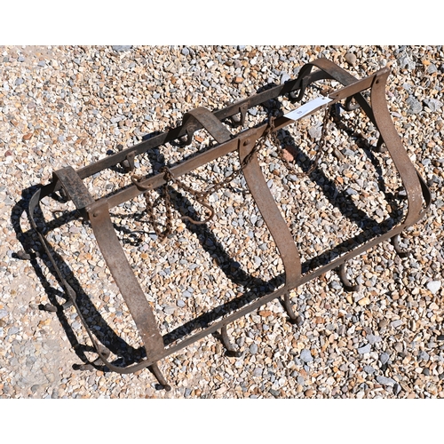 43 - A French wrought iron game hanger with triple Arabic form arch top, with suspension chain, 69 cm x 3... 