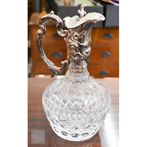 491 - A cut glass claret jug with EP collar, cover and handle, to/w an Art Deco style champagne ice-bucket... 