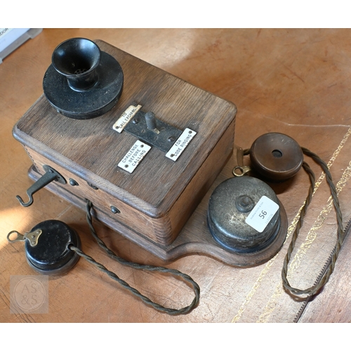 56 - A vintage oak cased railway type wall mounted telephone to/with two associated handsets, a/f