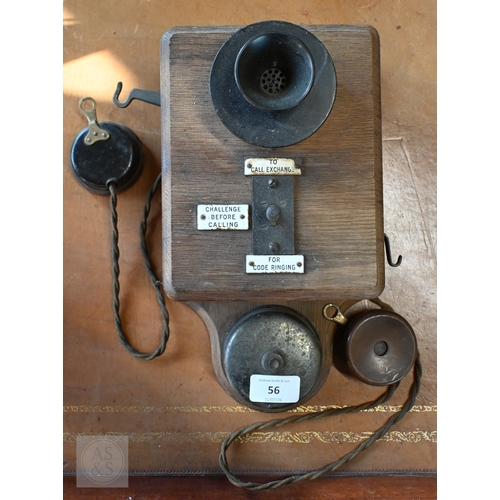 56 - A vintage oak cased railway type wall mounted telephone to/with two associated handsets, a/f