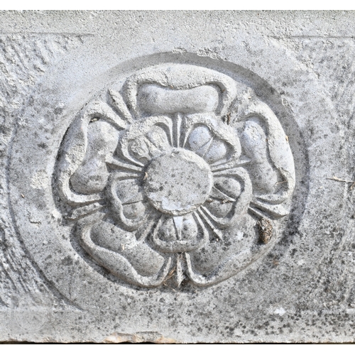 8 - A square cast stone planter with Hampshire rose panels, on blocks, 51 cm x 51 cm x 40 cm  to/w a pai... 