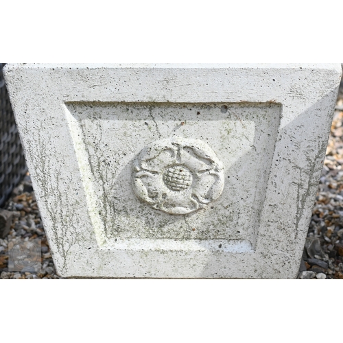 8 - A square cast stone planter with Hampshire rose panels, on blocks, 51 cm x 51 cm x 40 cm  to/w a pai... 