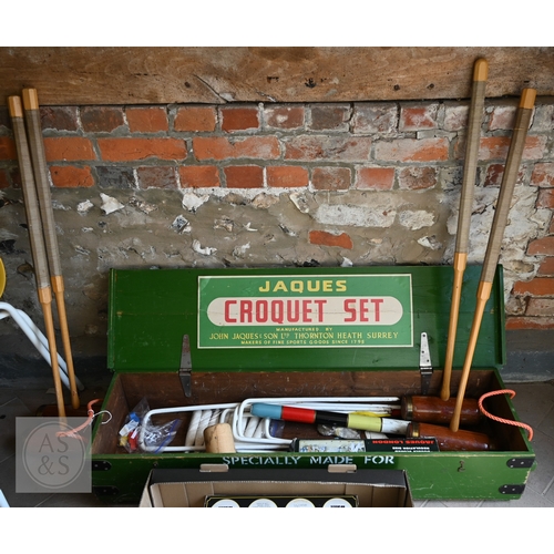 11 - Jaques, London for Harrods, a traditional croquet set in green stencilled box, complete with four ma... 