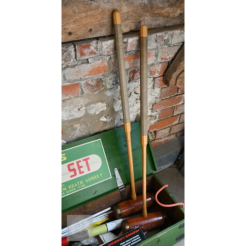 11 - Jaques, London for Harrods, a traditional croquet set in green stencilled box, complete with four ma... 