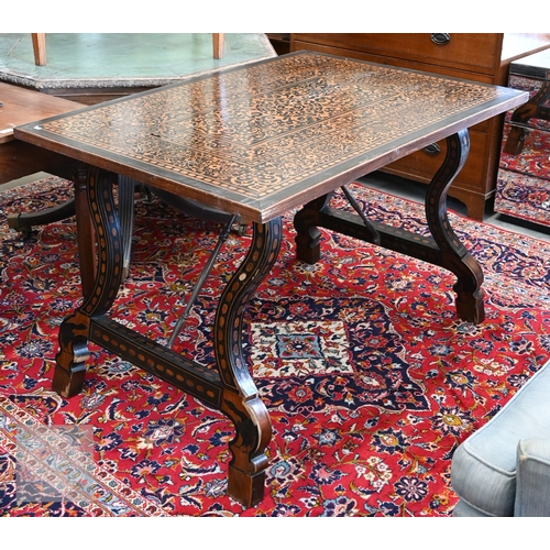 247 - An early 20th century Spanish Moorish influenced marquetry dining table, lyre shaped trestle support...