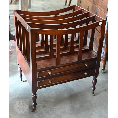 276 - A reproduction four division Canterbury with two drawers and turned supports with small brass caster... 