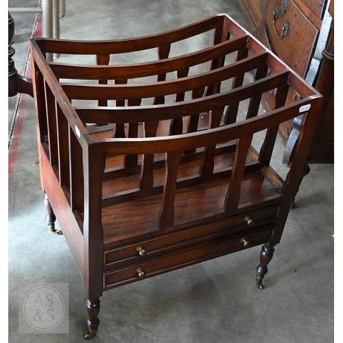 276 - A reproduction four division Canterbury with two drawers and turned supports with small brass caster... 