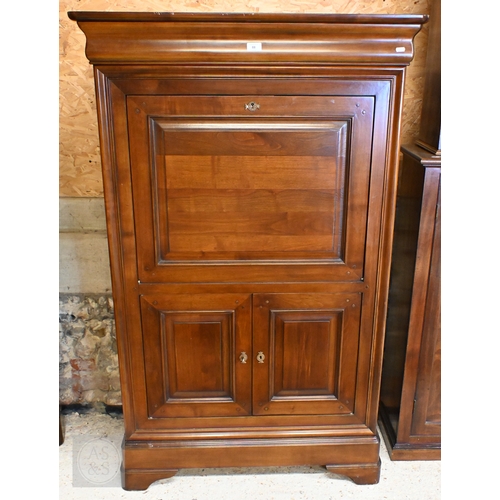 16 - Bridget Forestiere - A contemporary French cherrywood escritoire desk, the full width cavetto drawer... 
