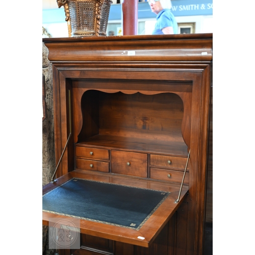 16 - Bridget Forestiere - A contemporary French cherrywood escritoire desk, the full width cavetto drawer... 