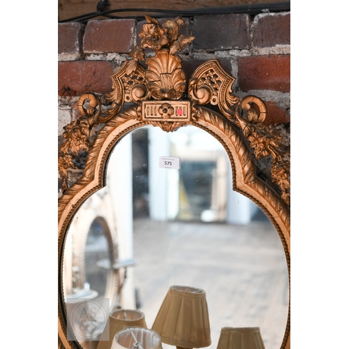 17 - An antique giltwood and gesso girandole mirror in the rococo style, of trefoil form surmounted by a ... 