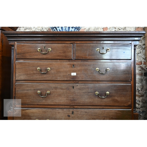 23 - A George III mahogany chest on chest, the moulded cornice over two short and three long graduated dr... 
