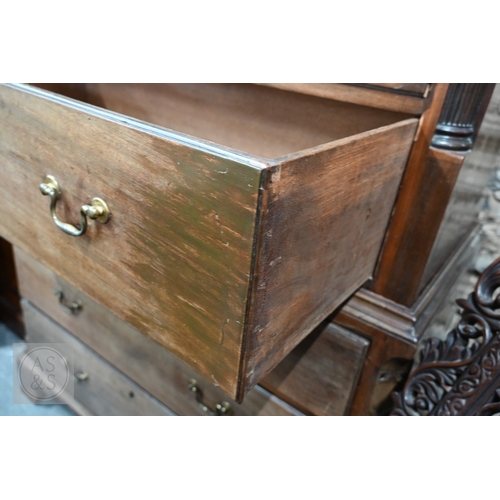23 - A George III mahogany chest on chest, the moulded cornice over two short and three long graduated dr... 