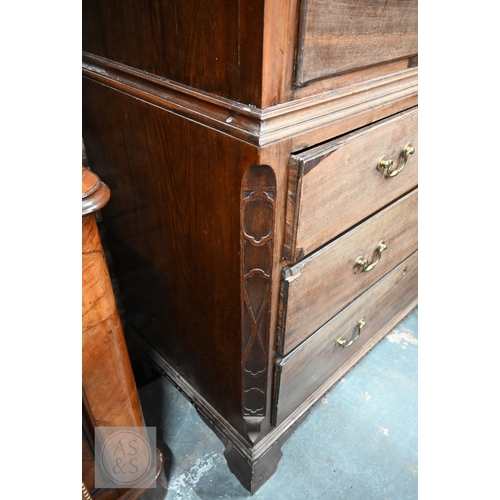 23 - A George III mahogany chest on chest, the moulded cornice over two short and three long graduated dr... 
