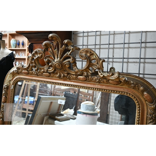 24 - A late 19th century French giltwood framed mirror, surmounted by composite fleur de lys device, 90 c... 