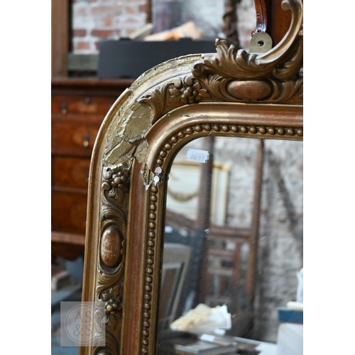 24 - A late 19th century French giltwood framed mirror, surmounted by composite fleur de lys device, 90 c... 
