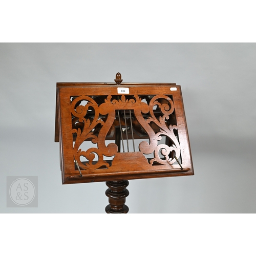 39 - A Regency mahogany double sided tripod music stand, the adjustable easels with fret cut lyre panel r... 