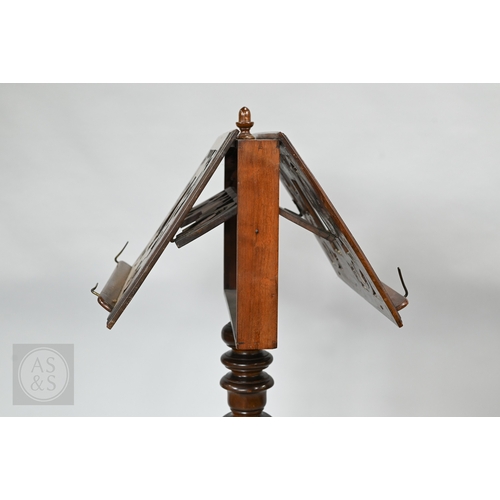 39 - A Regency mahogany double sided tripod music stand, the adjustable easels with fret cut lyre panel r... 
