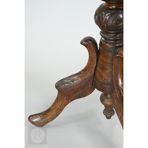 39 - A Regency mahogany double sided tripod music stand, the adjustable easels with fret cut lyre panel r... 