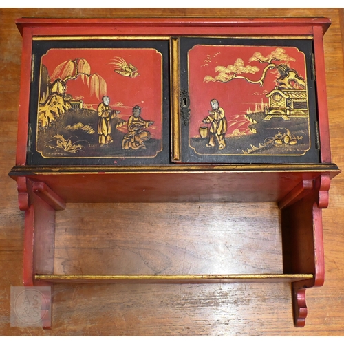 47 - A 20th century red lacquer chinoiserie side table on lyre shaped supports to/w a small wall mounting... 