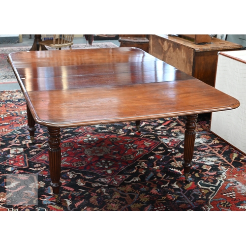 49 - # An early Victorian mahogany draw leaf dining table, the moulded edge top with rounded corners over... 